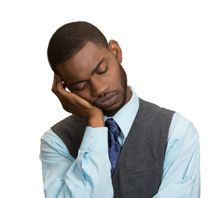 Closeup Portrait Sleepy young Business Man, funny guy placing head on hand, unhappy, Eyes Closed, isolated grey wall background. Negative human emotions, facial expressions, feelings, body language Closeup Portrait Sleepy young Business Man, funny guy placing head on hand, unhappy, Eyes Closed, isolated grey wall background. Negative human emotions, facial expressions, feelings, body language