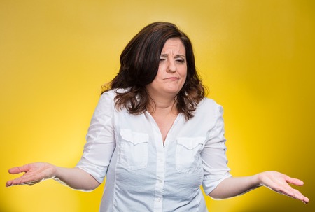 Portrait angry unhappy middle aged woman with arms out asking what's the problem who cares so what I...