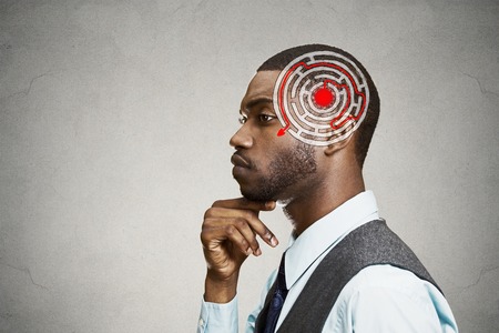 Right decision wisdom strategy concept. Side profile young man solving problem isolated on gray wall background. Face expressionの写真素材