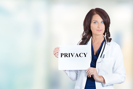 Female healthcare professional doctor scientist researcher pharmacist holding privacy sign isolated...