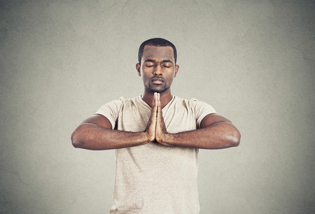 Handsome man doing yogaの写真素材