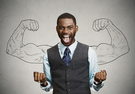 Closeup portrait happy successful student, business man winning, fists pumped celebrating success...