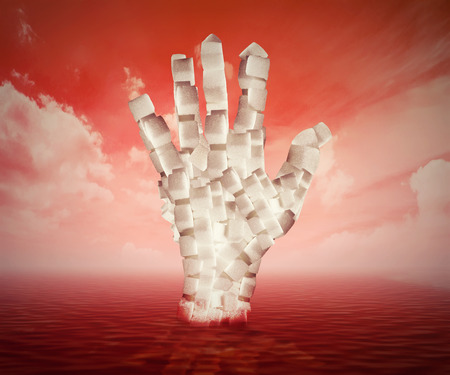Sugar concept sweet food ingredients. White cubes shaped as human hand floating in blood. Diet...