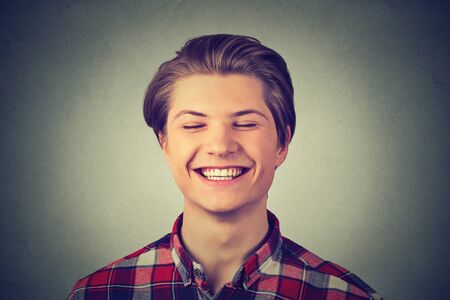 Young man laughing