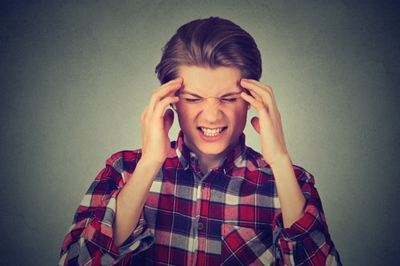 Stressed man upset frustrated. Negative human emotions face expression feelingsの写真素材