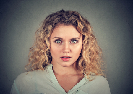 Concerned scared shocked womanの写真素材