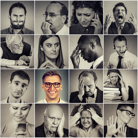 Multiethnic group of frustrated, sad, desperate, stressed people and a happy smiling man の写真素材