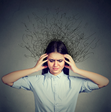 closeup sad young woman with worried stressed face expression and brain melting into lines question...