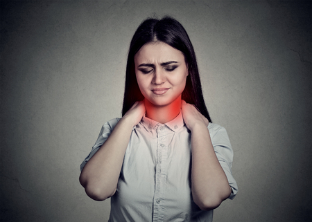 Young woman with neck pain