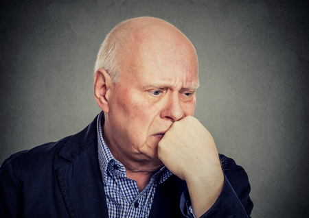 Sad lonely elderly man feeling lonely