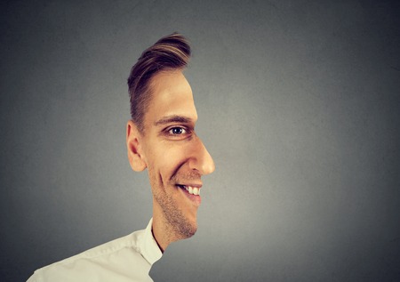 surrealistic portrait front with cut out profile of a manの写真素材