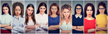 Angry grumpy group of pessimistic women with bad attitude looking at you