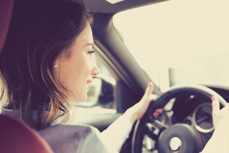 young woman driving a car