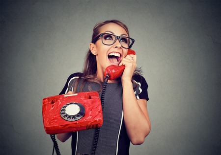 Laughing woman on the phone