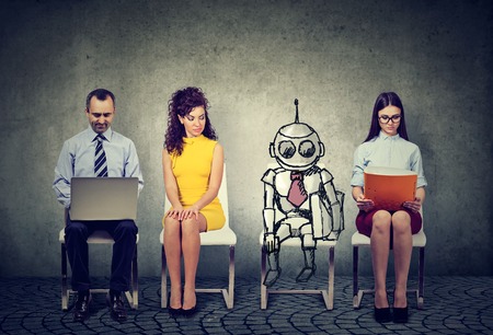 Cartoon robot sitting in line with applicants for a job interview の写真素材