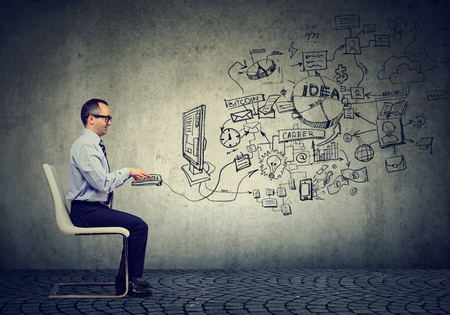 Mature businessman working in an officeの写真素材