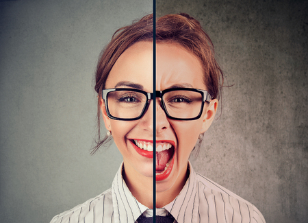 Bipolar disorder concept. Young woman with double face expression isolated on gray background