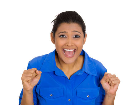 Portrait of a surprised young woman looking at camera