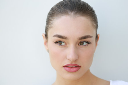 Closeup headshot of a beautiful young woman