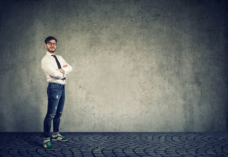 Portrait of a young confident cool looking guyの写真素材