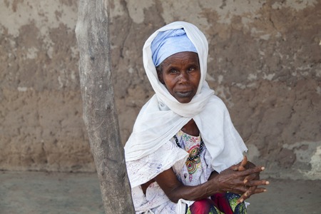 Gabu, Guinea-Bissau - May 9, 2014: Portrait of an afican women in traditional clothingのeditorial素材