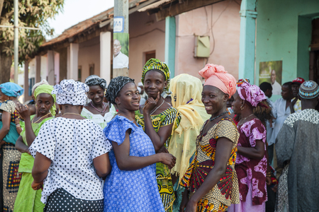 Gabu, Guinea-Bissau - March 28, 2014: african women gathering for a wedding cerimonyのeditorial素材