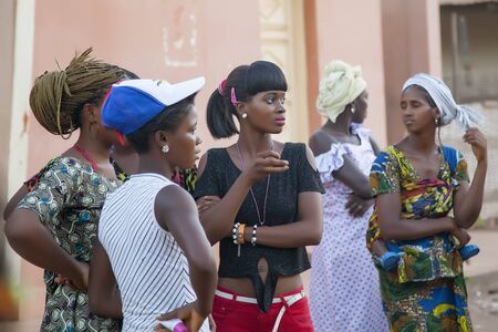 Gabu, Guinea-Bissau - April 9, 2014: Unidentified African young girls at a public gatheringのeditorial素材