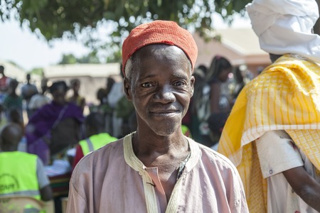 Gabu, Guinea-Bissau - April 13, 2014: Portrait of an African village chief at a polling station on election dayのeditorial素材