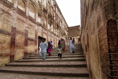 Lahore, Pakistan - April 27, 2013: Family visiting in Lahore fort, one of the main attractions in the cityのeditorial素材