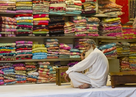 Vendor at the Anarkali bazar doing business over the phoneのeditorial素材