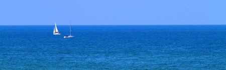 yachts sailing in the seaの写真素材