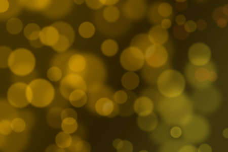 a gold bokeh pattern as a backgroundの写真素材