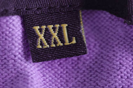 An XXL label on a piece of clothing の写真素材