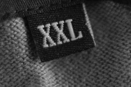 An XXL label on a piece of clothing の写真素材