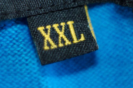 An XXL label on a piece of clothing の写真素材