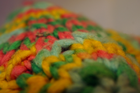 Coloful knitted yarn polygon math-toy (Macro detail)の写真素材