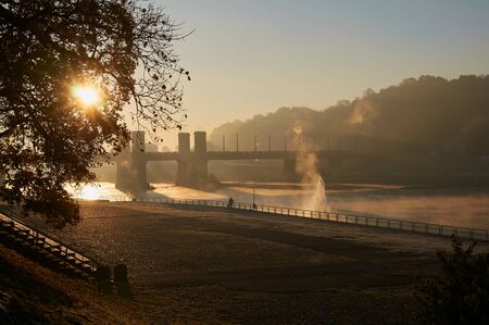 Small old town in sunrise time near riverの写真素材