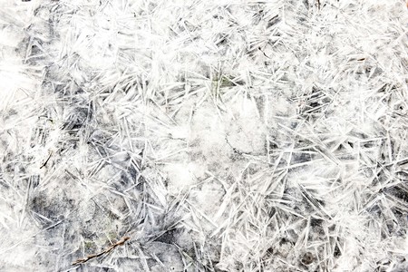 White ice and snow at ice rink as background