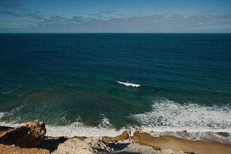 Aerial view of the hillside of the desert beach of Morocco.の写真素材