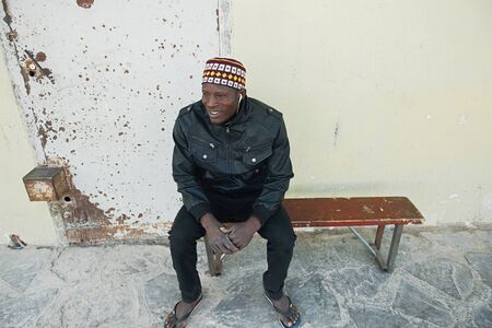 Nouadhibou, Mauritania, JANUARY 18, 2020: Close up portrait of smiling face of young african manのeditorial素材