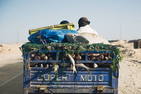 SAHARA DESERT, MAURITANIA - JANUARY 18, 2020: Three wheeler used for transportation fish in...