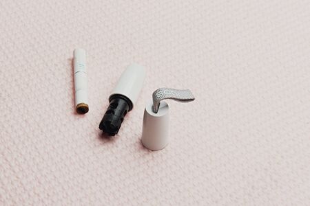 Kaunas, Lithuania - February 26, 2020: smoked used HEETS sticks for IQOS device macro photoのeditorial素材