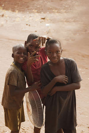 Soungou Roungou, Senegal, Africa, January 19, 2020: horizontal photography of three small boys,...