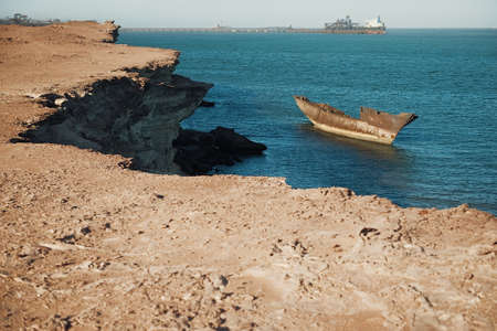 Nouadhibou, Mauritania, JANUARY 18, 2020: Abandoned and derelict old shipwreck at the Atlantic Coast near Sahara in Africa, Mauritaniaのeditorial素材