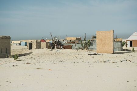 Small improvised houses in the Sahara Desert, in Mauritaniaの写真素材