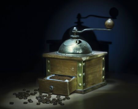 Wooden vintage coffee grinder, brown, manual, grains, ground.の写真素材