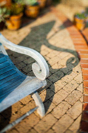 Bench and shadows taken in a miniature styleの写真素材