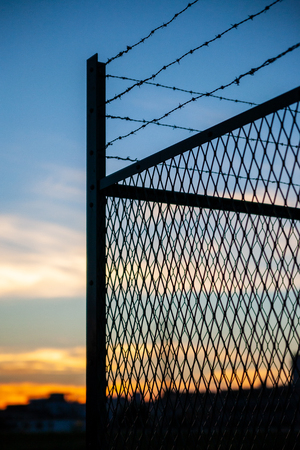 Fence and barbed wireの写真素材