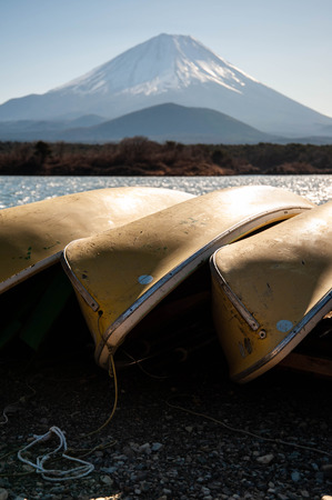 Lake boat with a view of Mount Fujiの写真素材