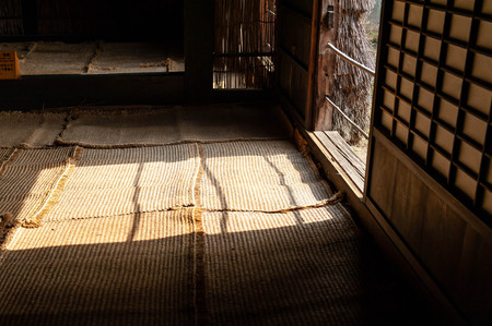 Light entering the floor of a wooden farmhouseの写真素材